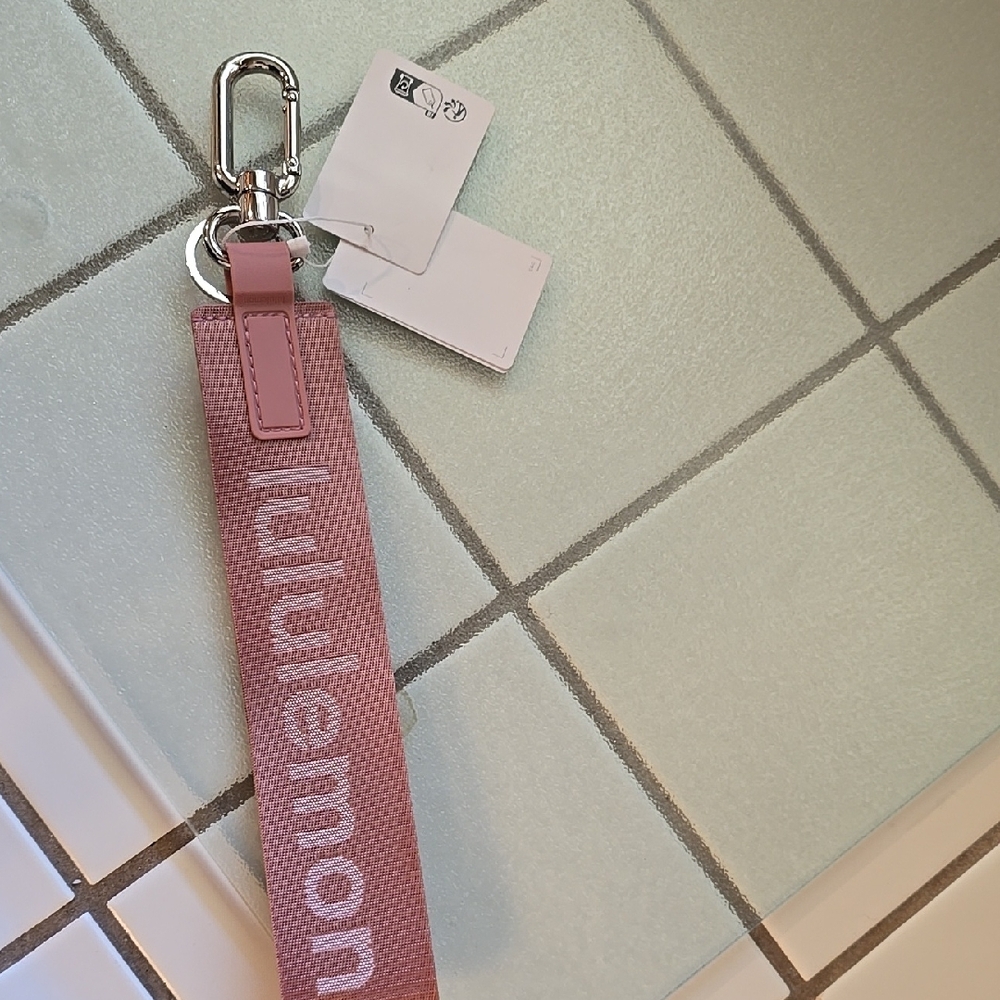 NWT Lululemon athletica Never Lost Pink Keychain. Silver Hardware